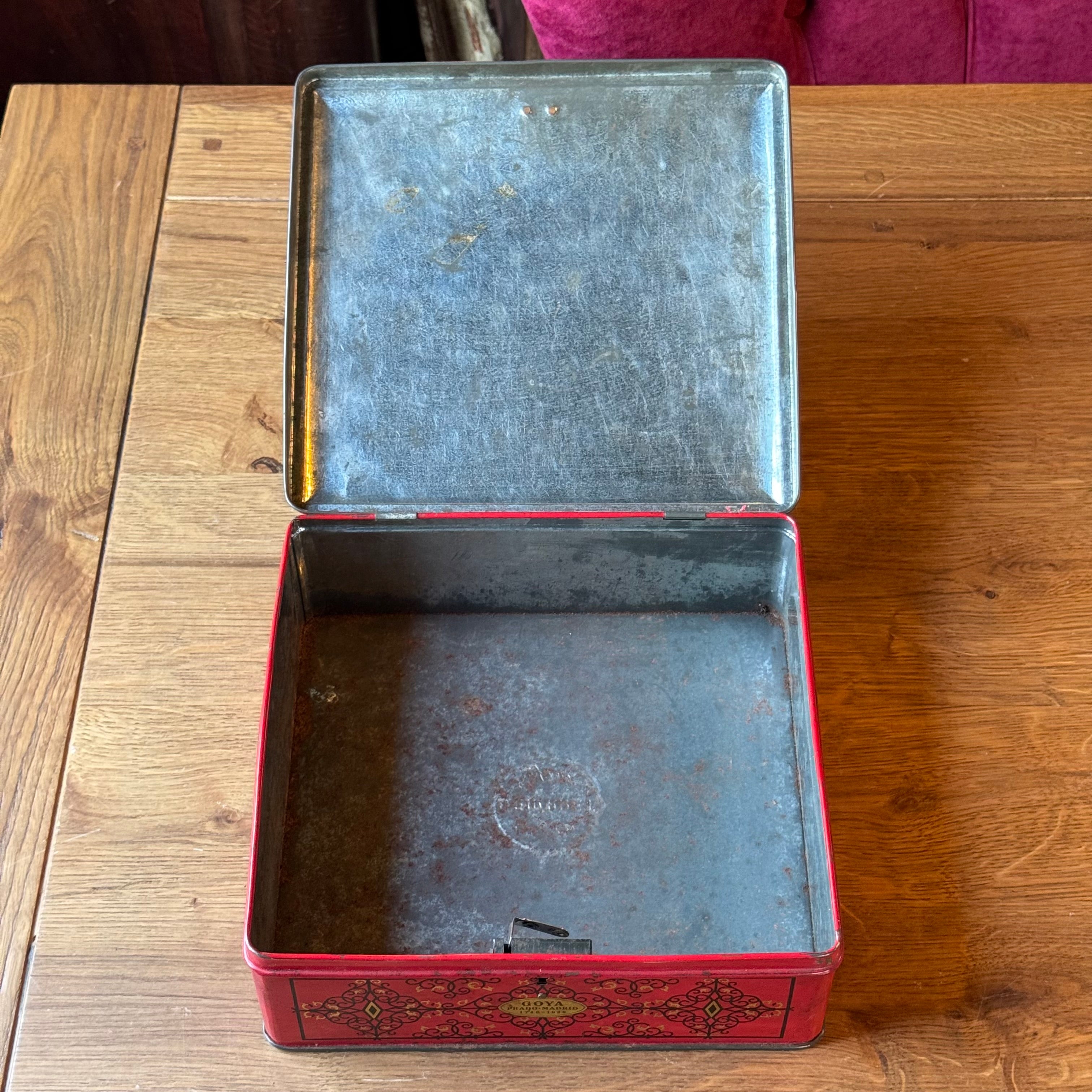 Large red Goya tin with 18th century dance scene, Demaret Confiserie