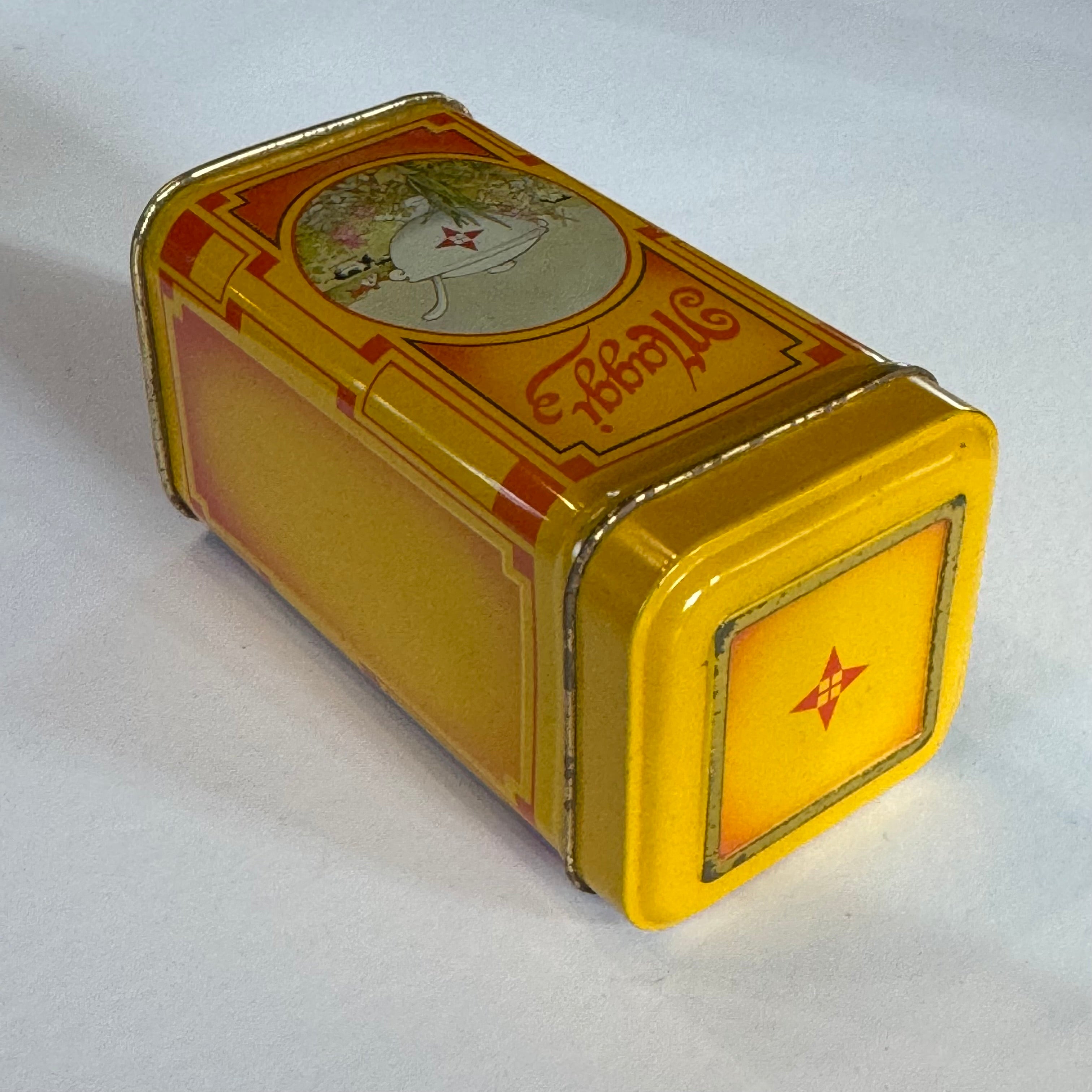 Vintage Maggi tin – yellow with Art Deco design