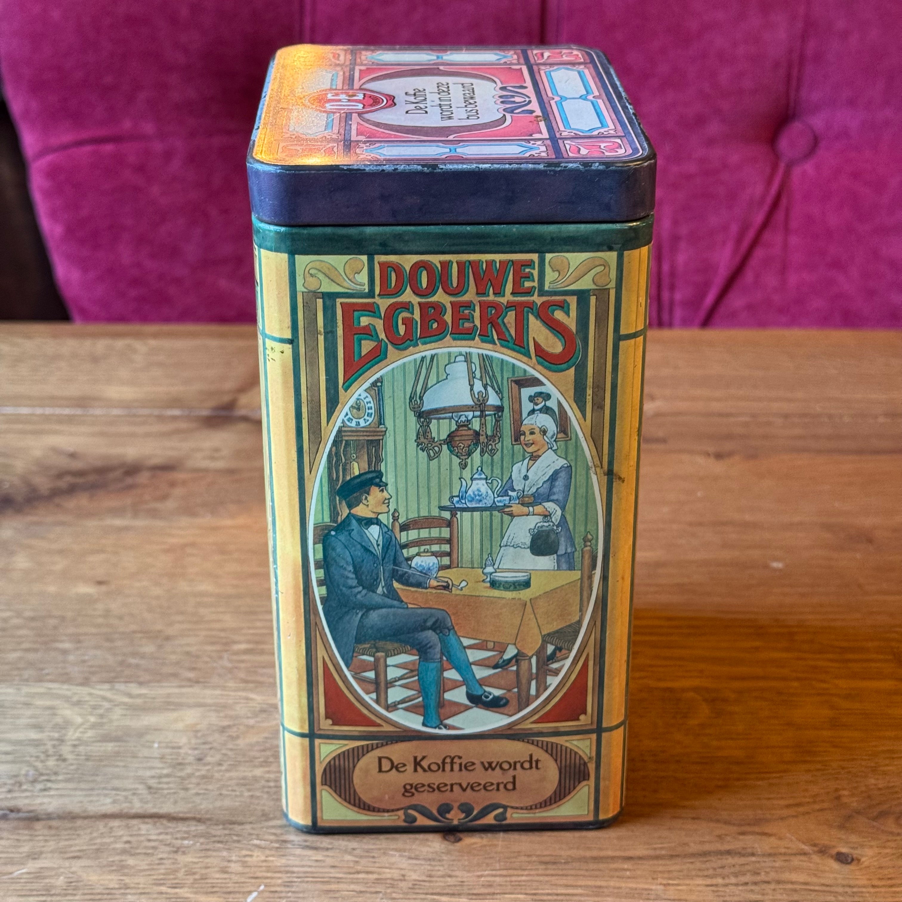 Antique Douwe Egberts coffee tin with scenes from the coffee ritual