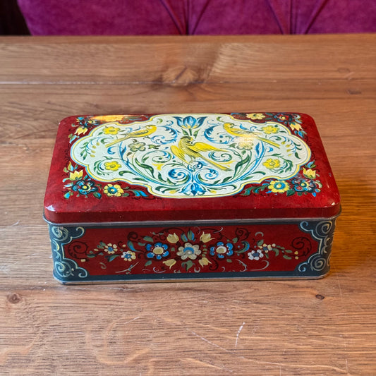 Vintage handbeschilderd blik met vogel- en bloemmotief