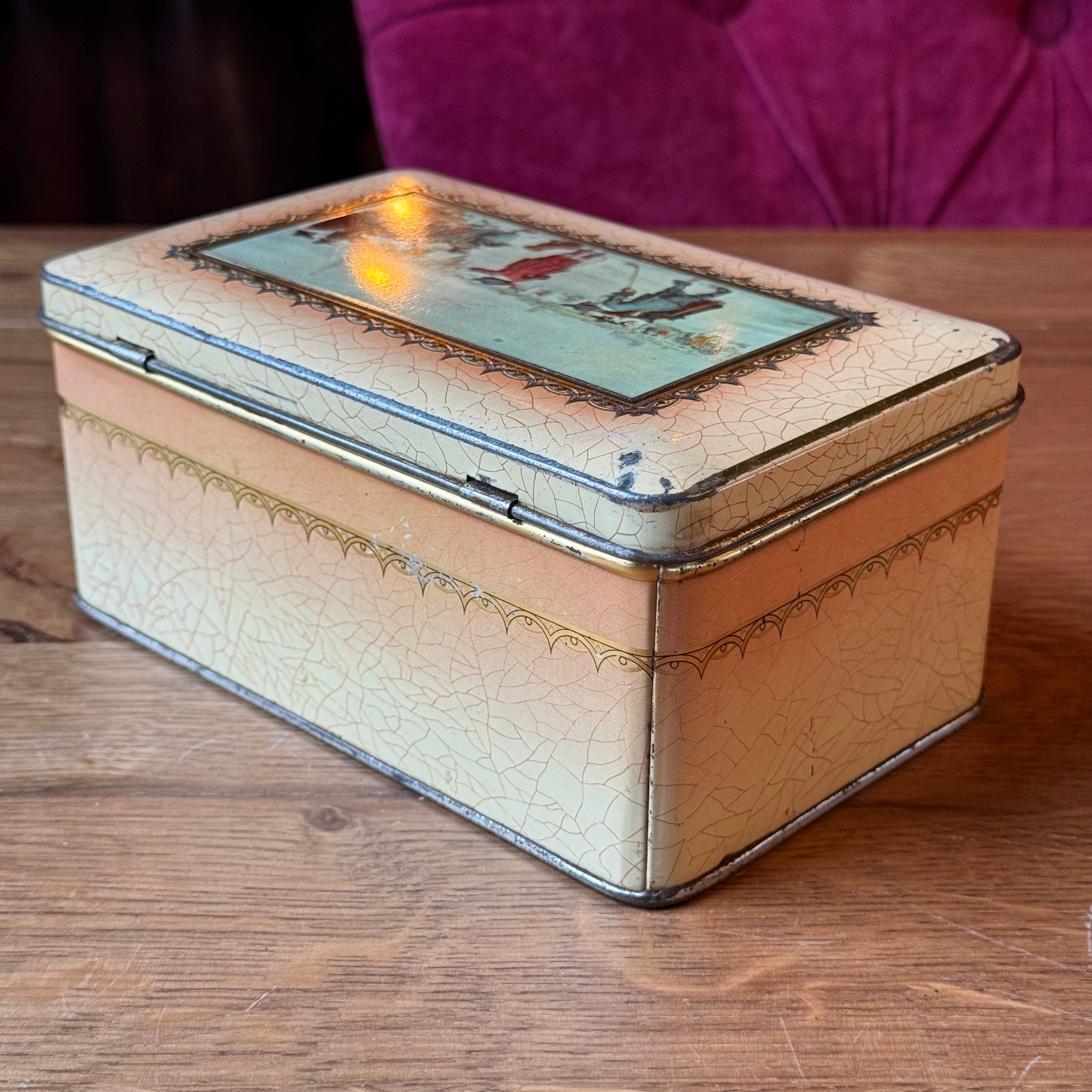 Vintage tea tin with a winter Avercamp scene – "Kolven op het IJs" (Food on the Ice)