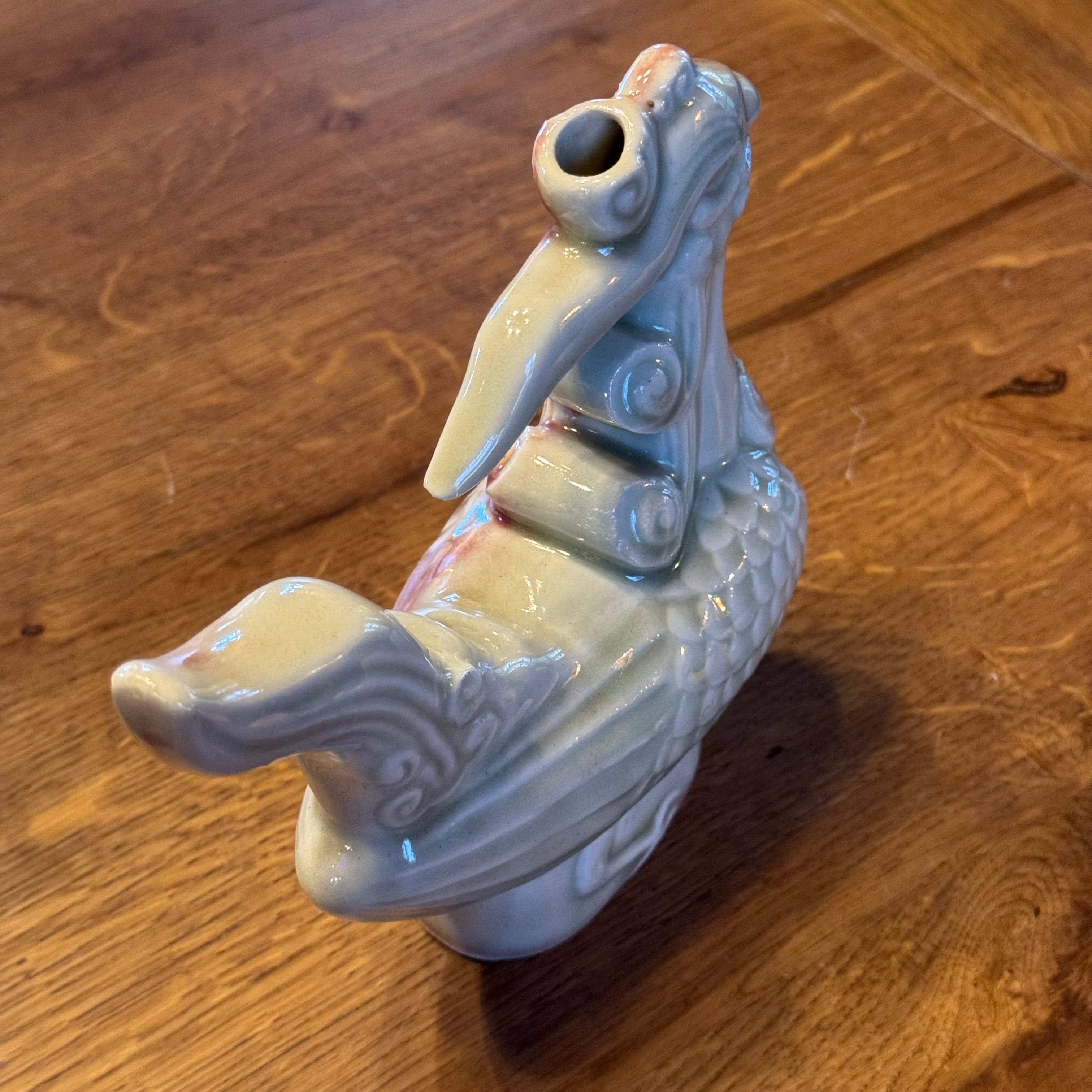 Phoenix-Keramikkrug – cremefarbene bis rosafarbene Glanzglasur, 20. Jahrhundert