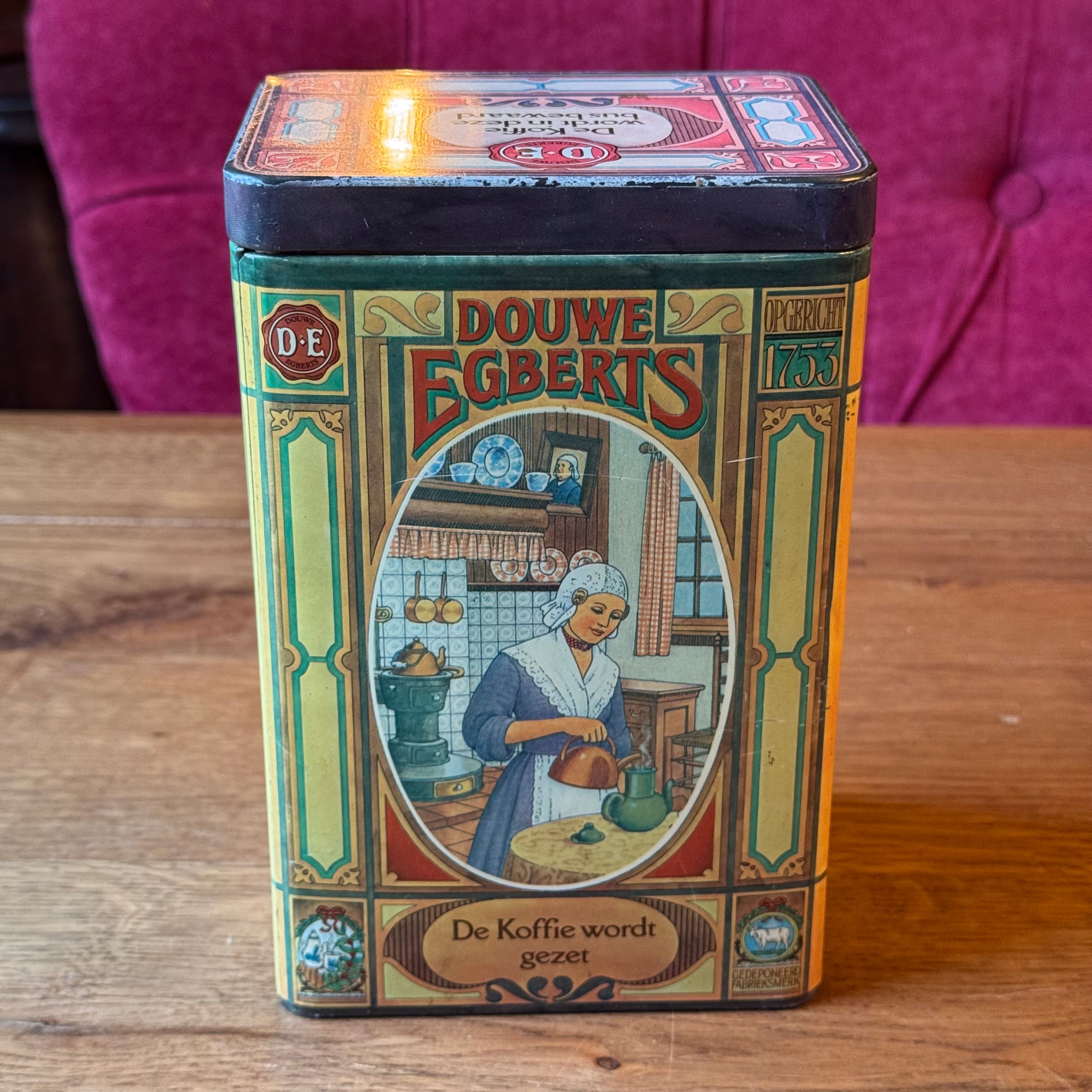 Antique Douwe Egberts coffee tin with scenes from the coffee ritual