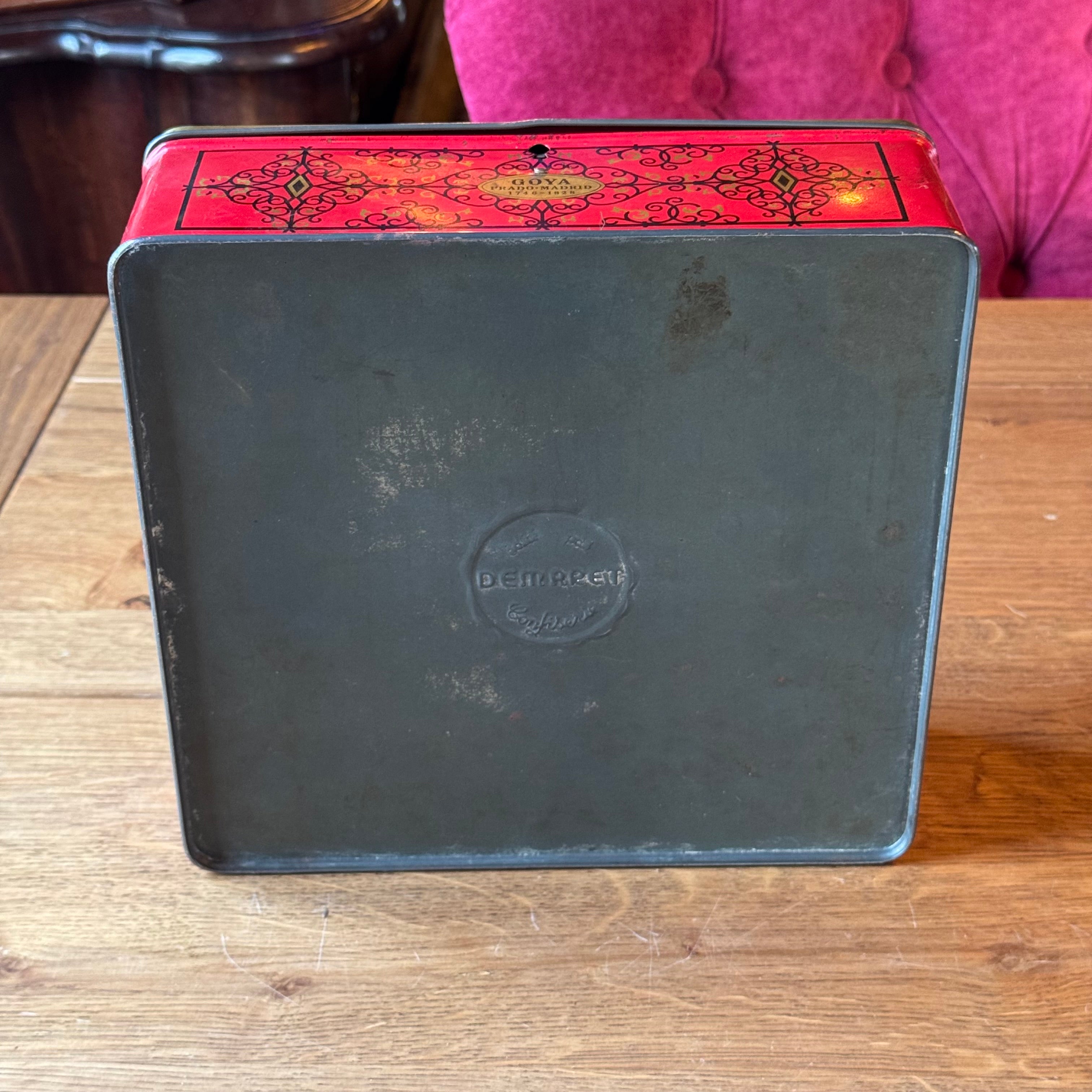 Large red Goya tin with 18th century dance scene, Demaret Confiserie