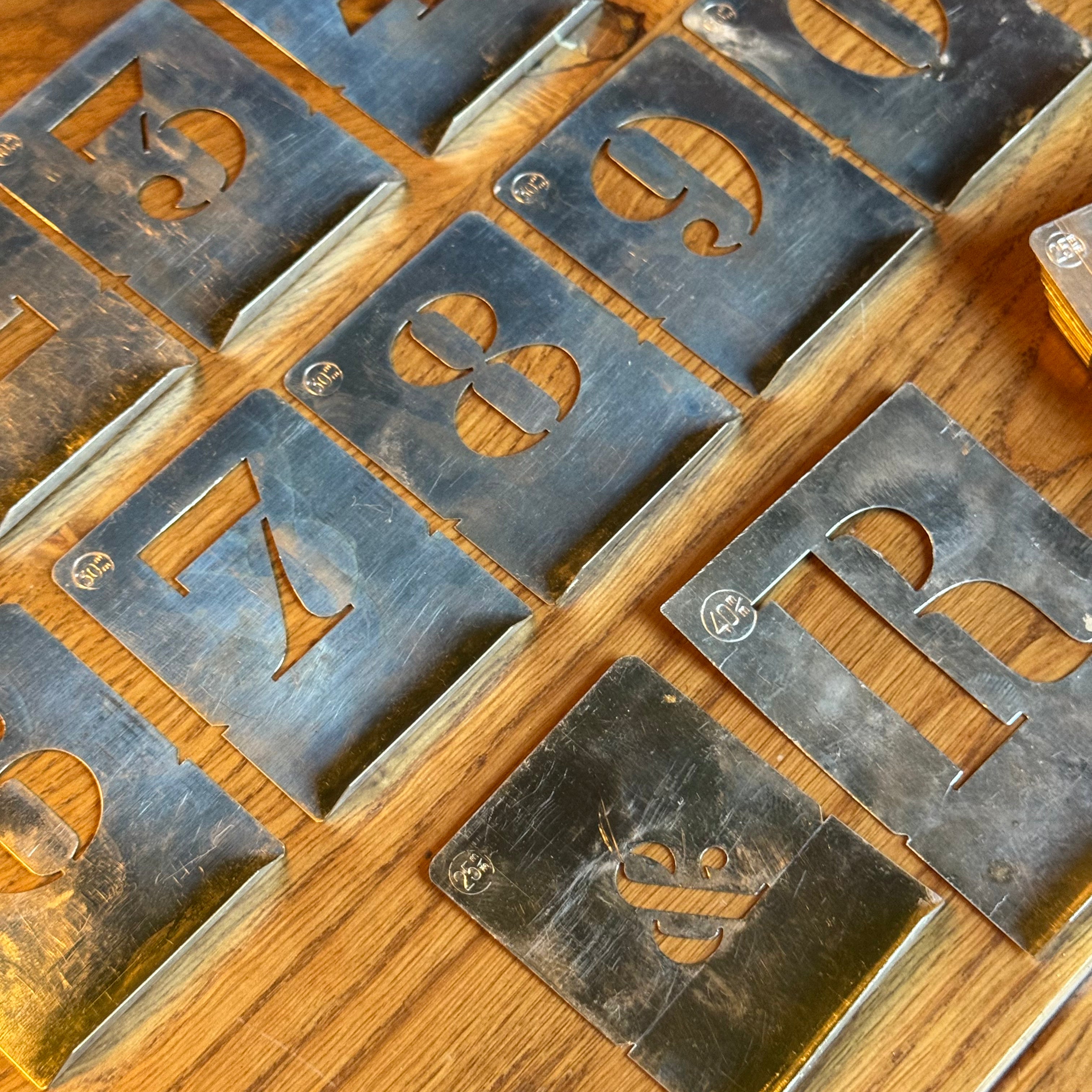 Box with letter and number stencils