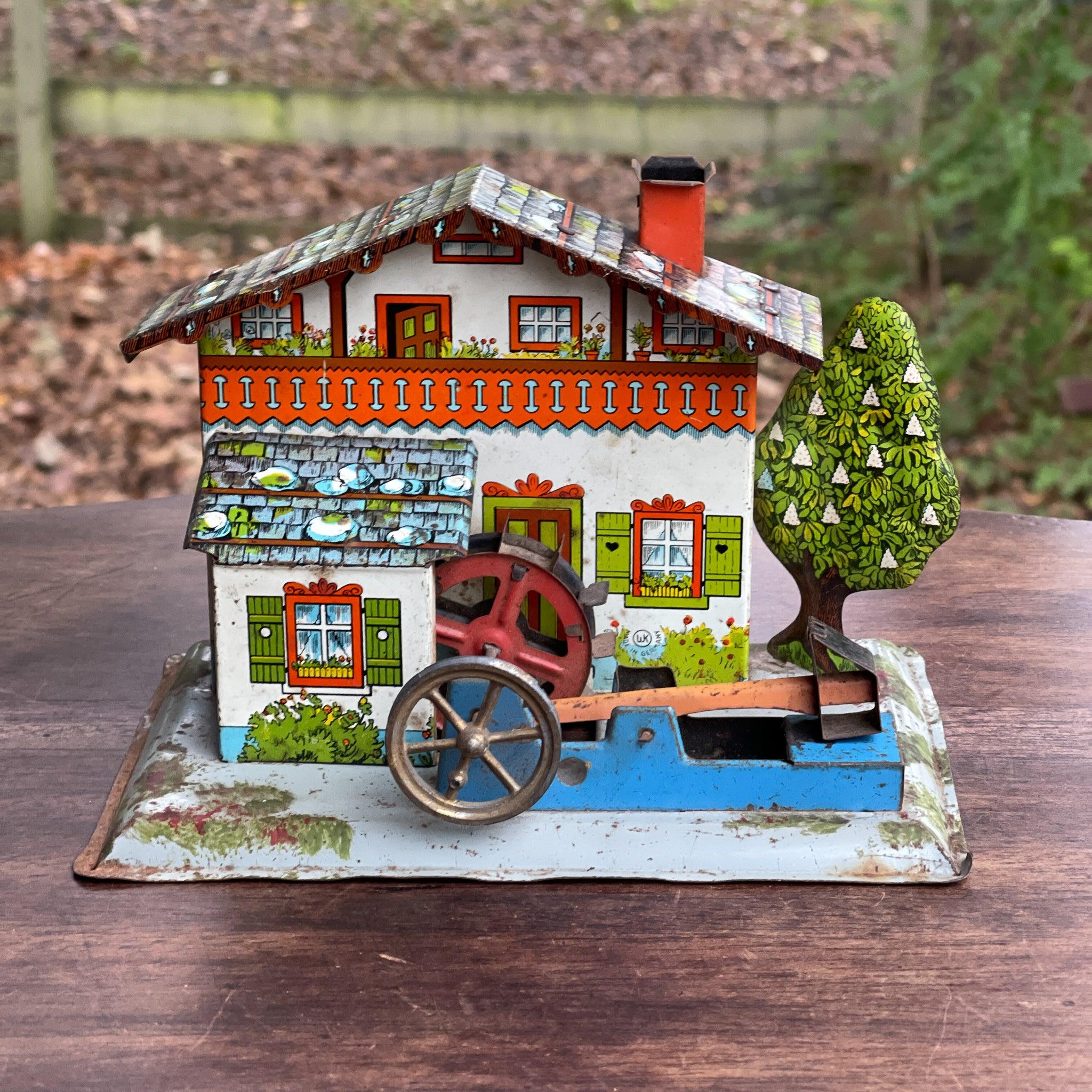 Antieke blikken watermolen voor stoommachine - The Collectionist