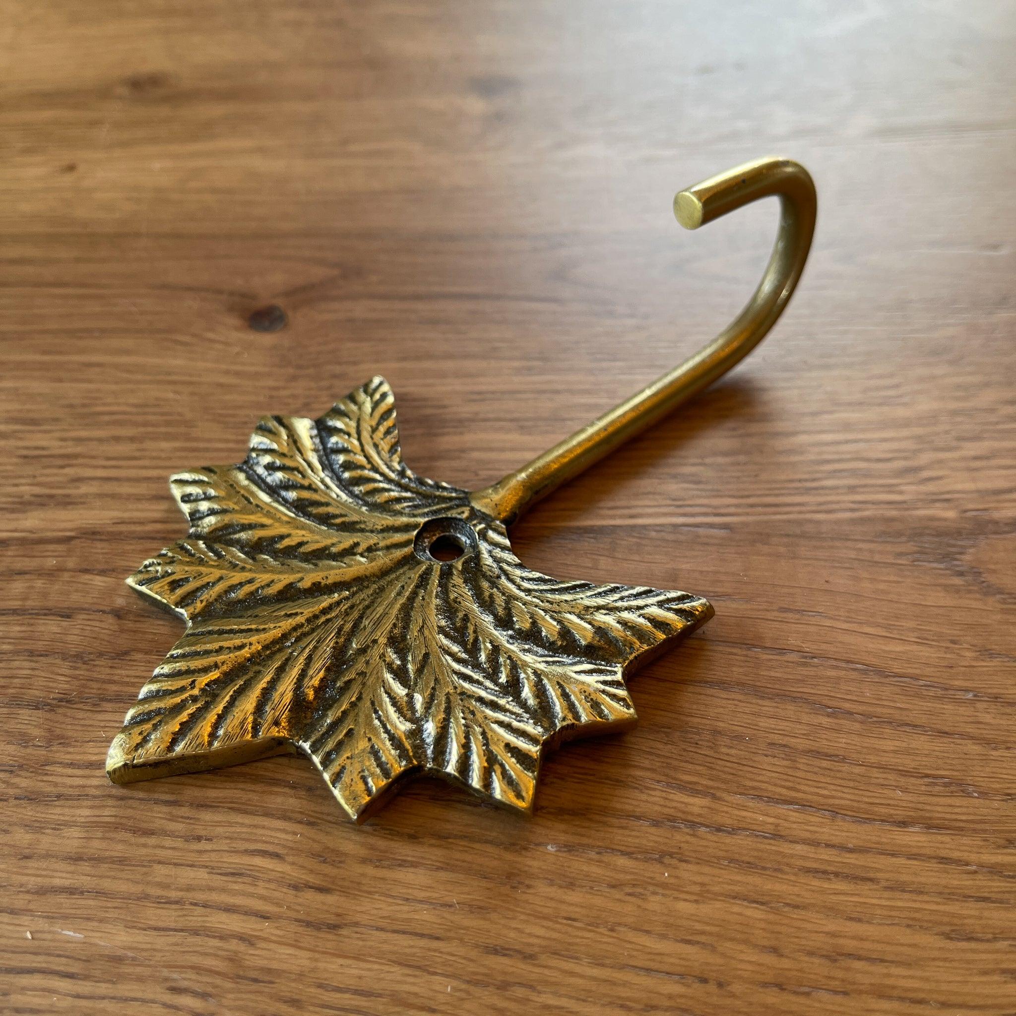 Gouden wandhaak met palm - The Collectionist