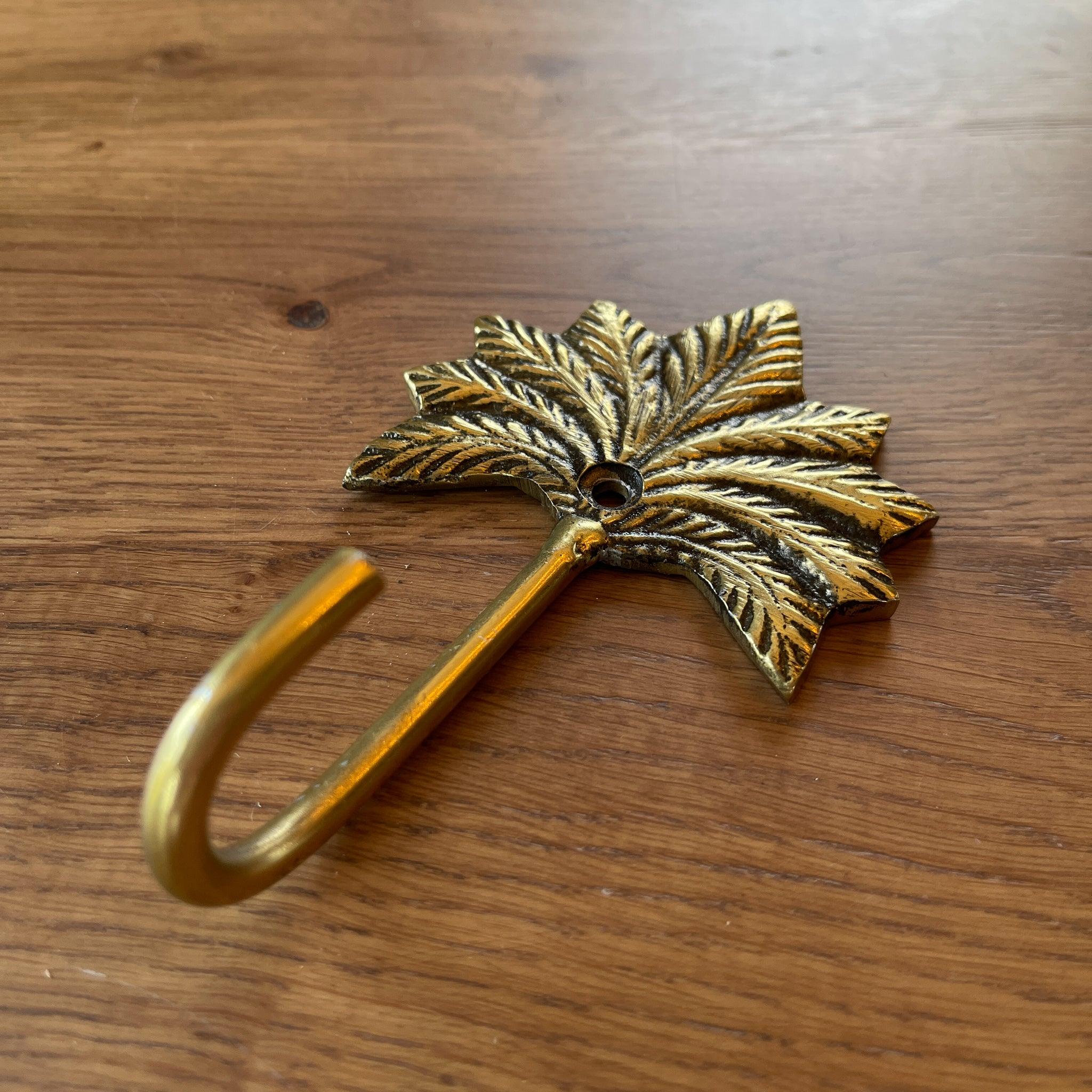 Gouden wandhaak met palm - The Collectionist