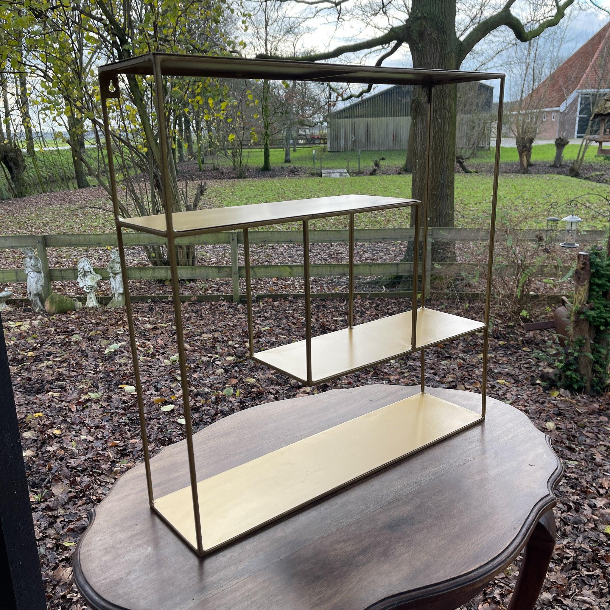 Goudkleurig wandrek van metaal - The Collectionist