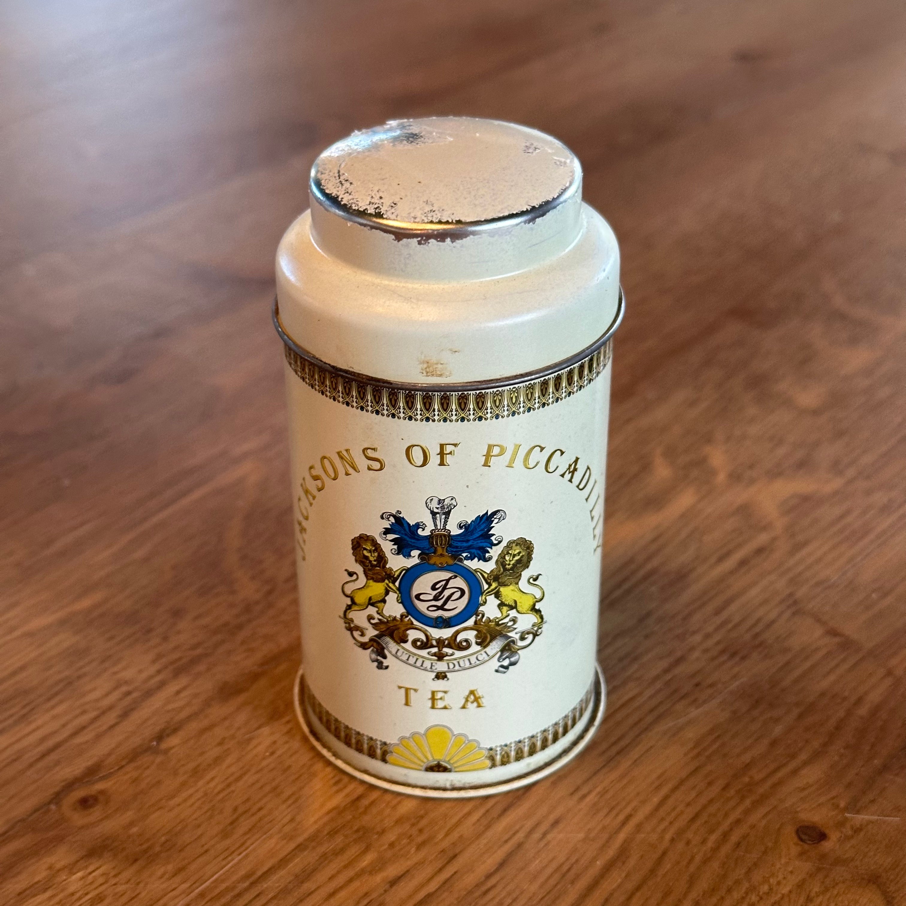 Vintage 4 theeblikjes van Jacksons of Piccadilly, perfect voor theeliefhebbers en decoratie.