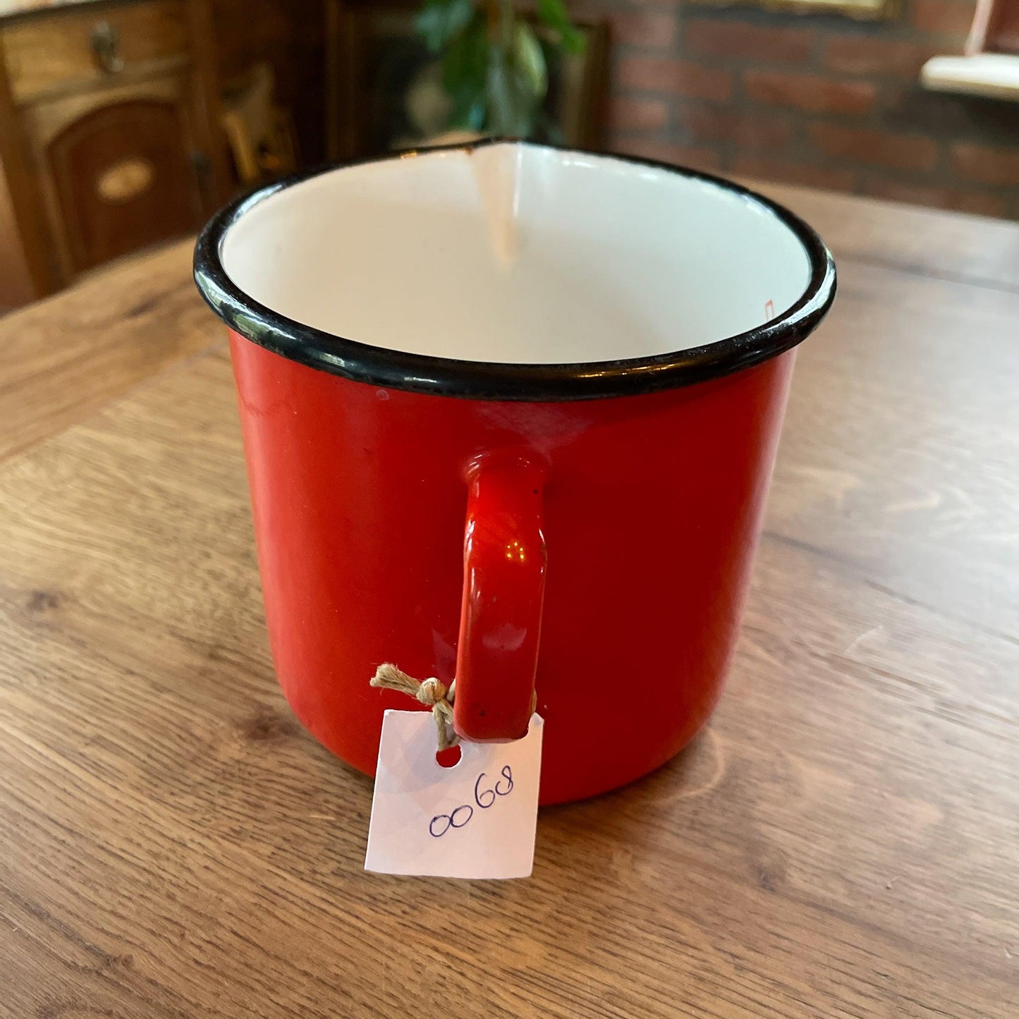 Rode emaille maatbeker 1L - Bamestra Curiosa