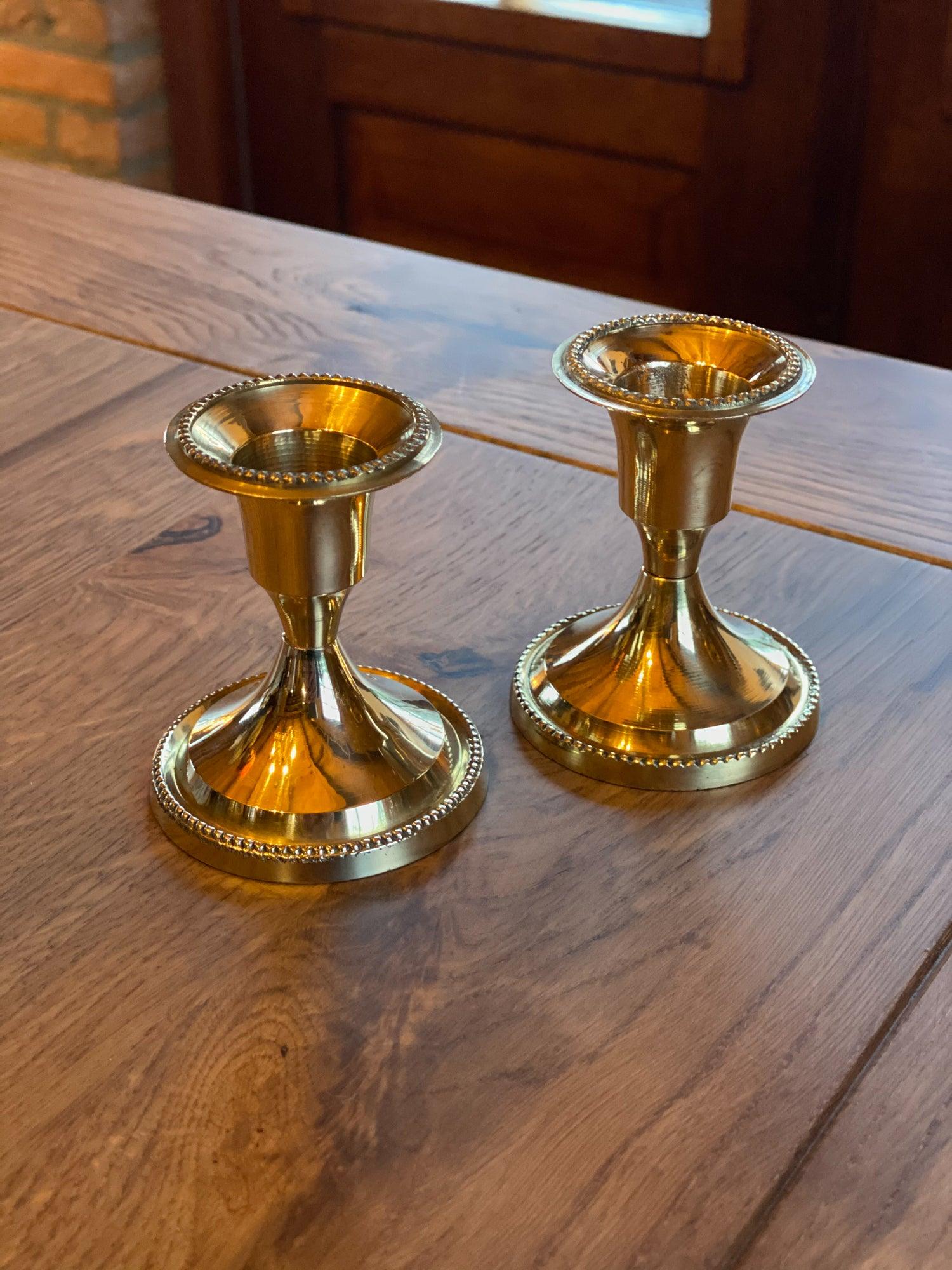 Twee kandelaars van koper - The Collectionist