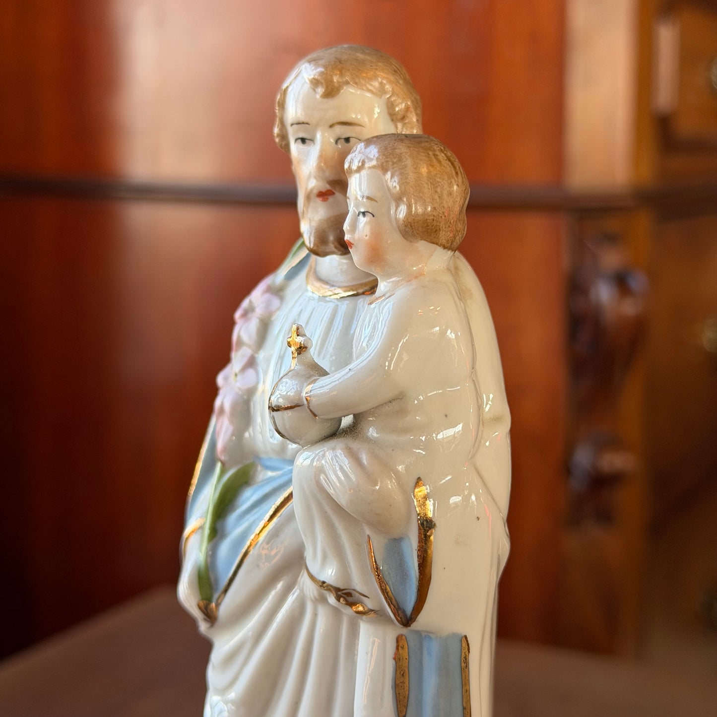Antique porcelain statue of Saint Joseph with Child – hand-painted religious statue (ca. 1900–1930)