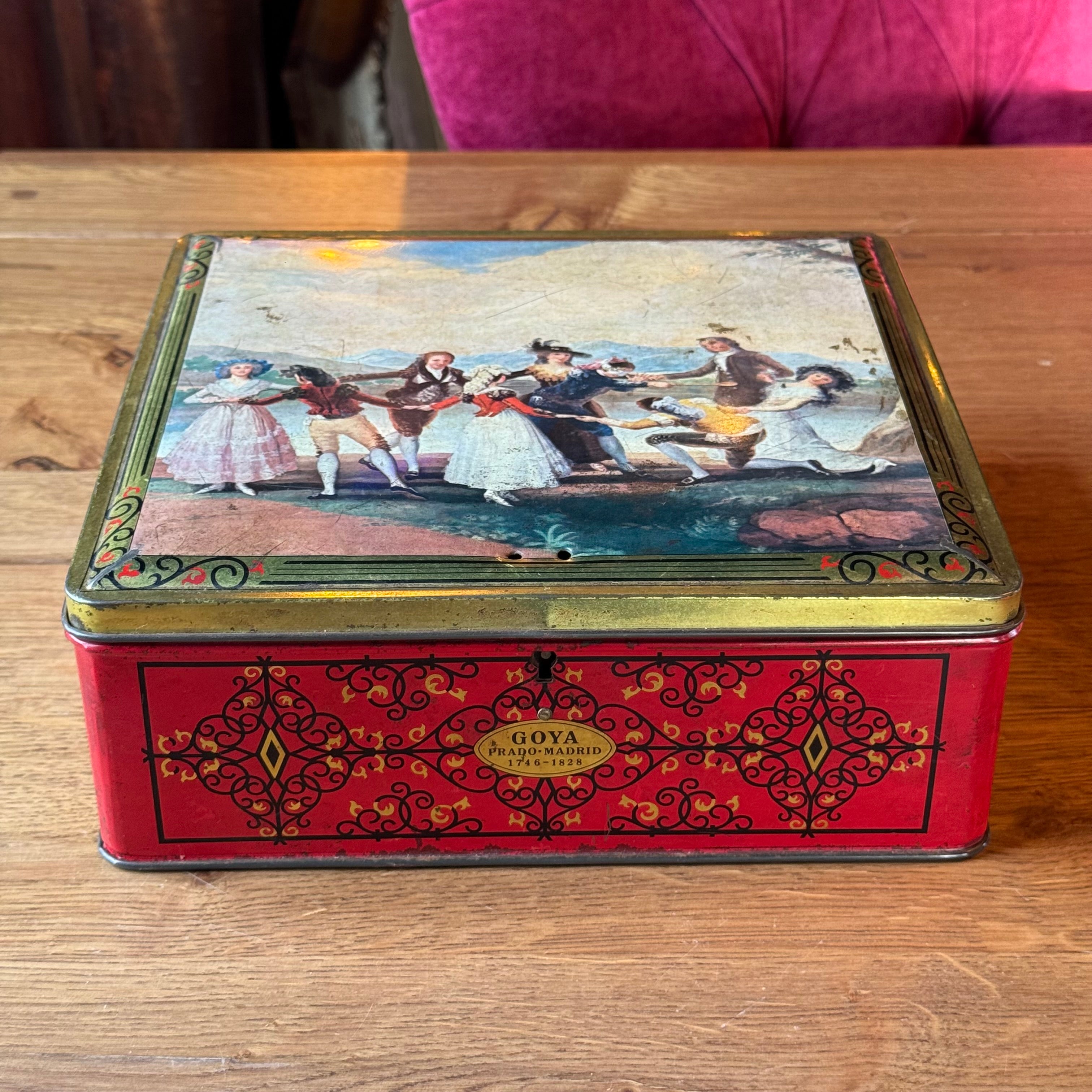 Large red Goya tin with 18th century dance scene, Demaret Confiserie