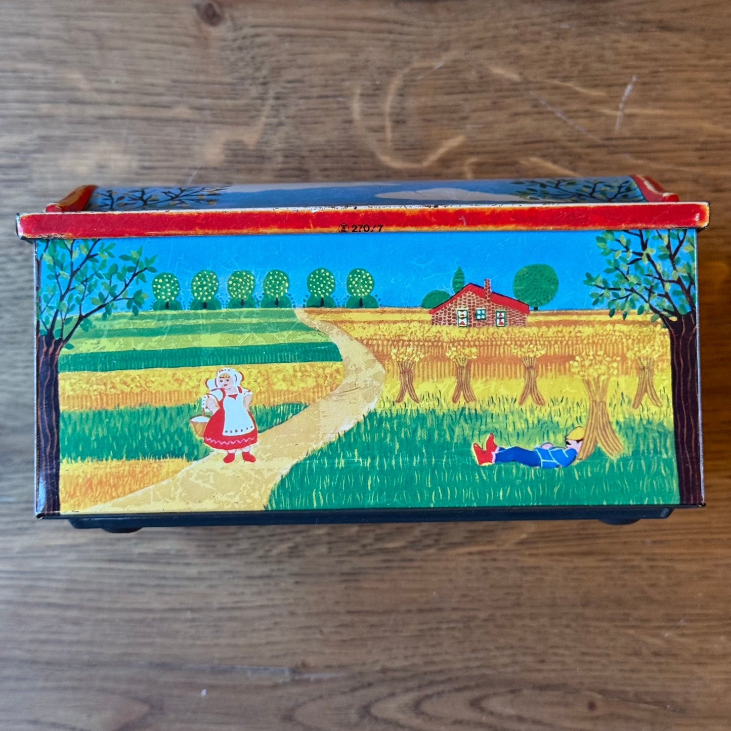 Vintage De Beukelaer blikken trommel met seizoensillustraties