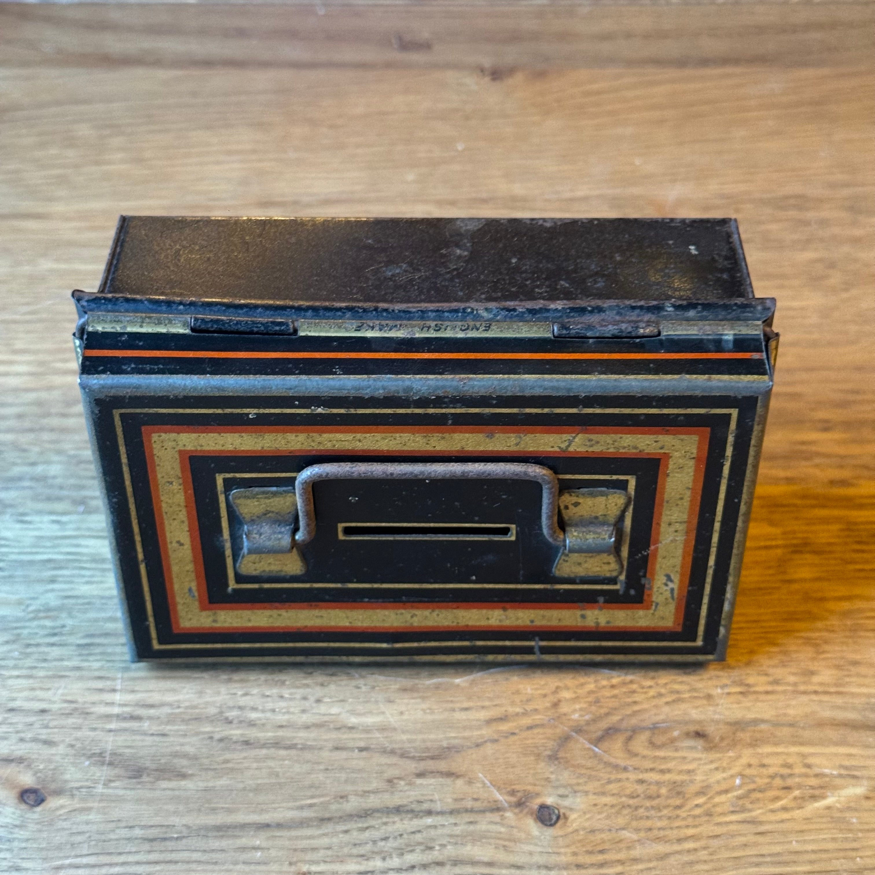 Vintage Metal Savings or Document Box with Key – Black with Gold/Red Decor (ca. 1920–1935)