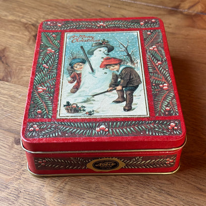 Vintage Nobis Printen Kerstblik – Retro Christmas Tin met Kinderen & Sneeuwpop (jaren ’90)