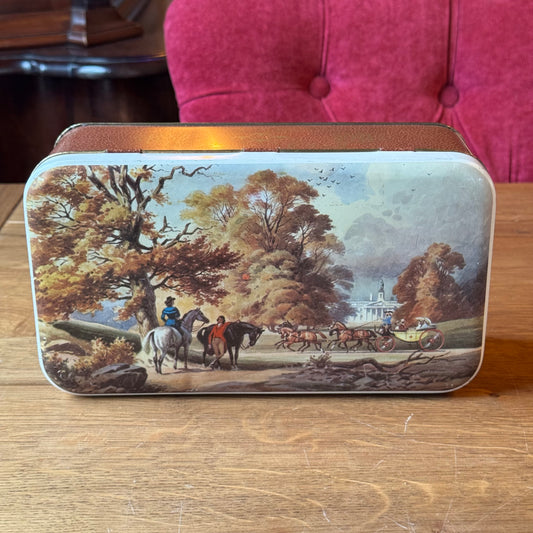 Vintage rectangular storage tin with horse-drawn carriage decor