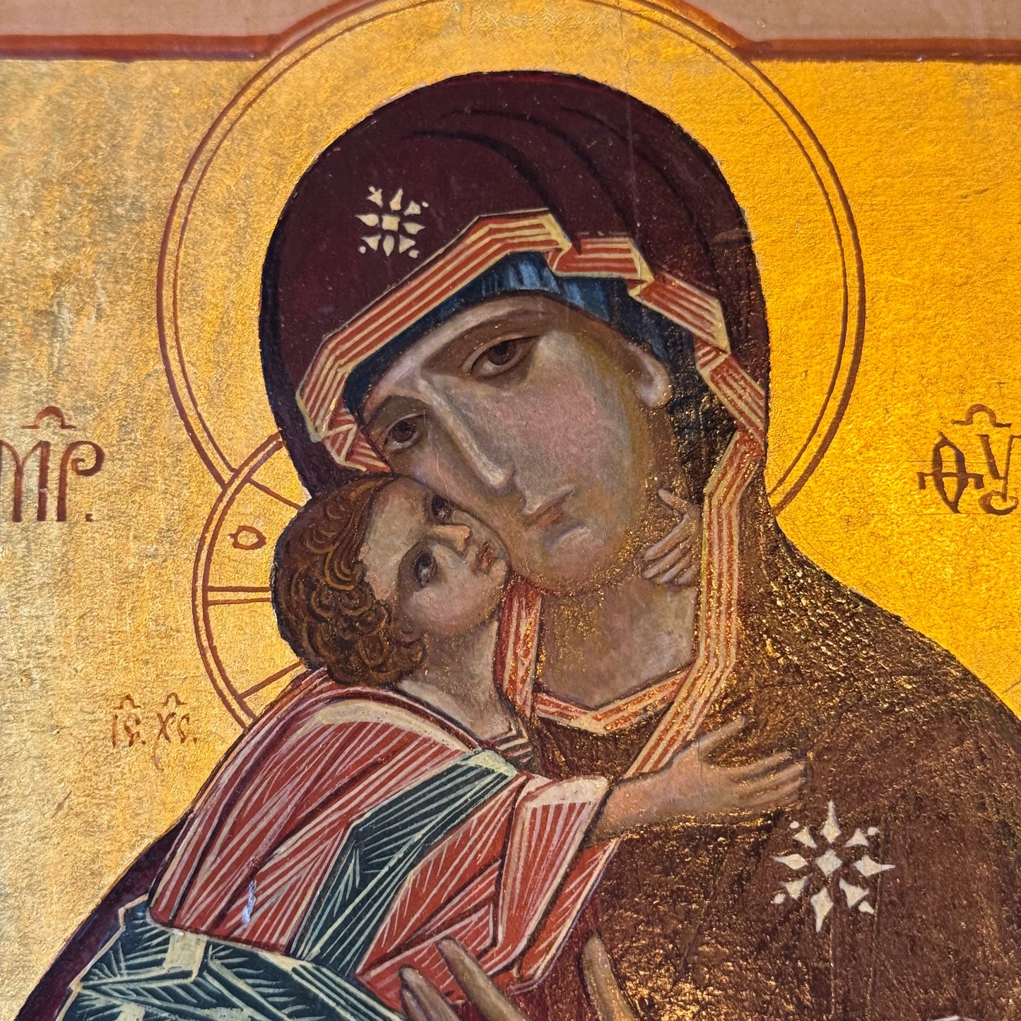 Byzantine Mother of God icon with gold leaf and studio photo of Jerusalem (1977)