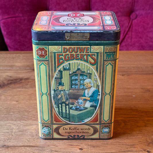 Antiek Douwe Egberts koffieblik met scènes uit het koffieritueel