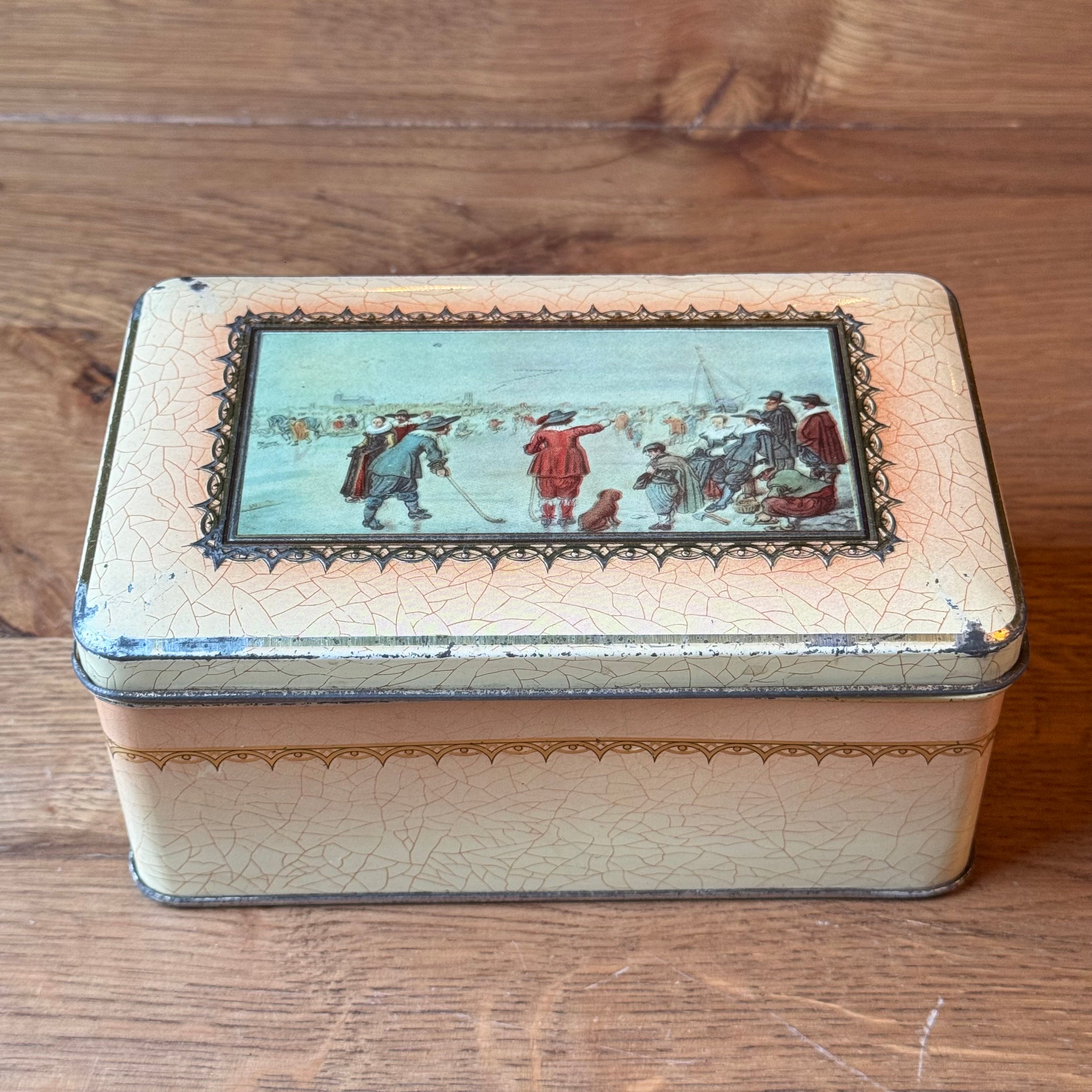 Vintage tea tin with a winter Avercamp scene – "Kolven op het IJs" (Food on the Ice)