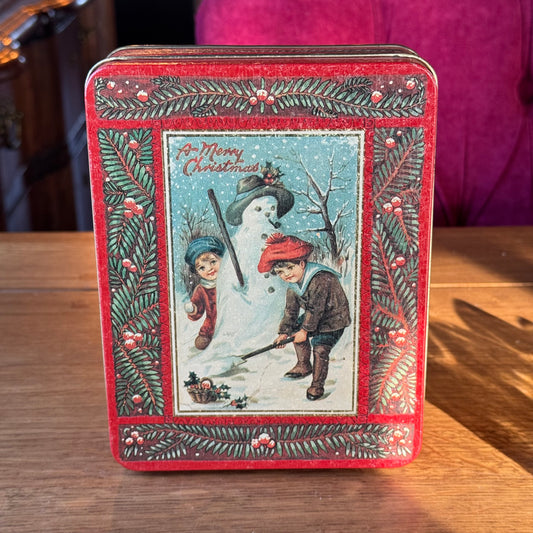 Vintage Nobis Printen Kerstblik – Retro Christmas Tin met Kinderen & Sneeuwpop (jaren ’90)