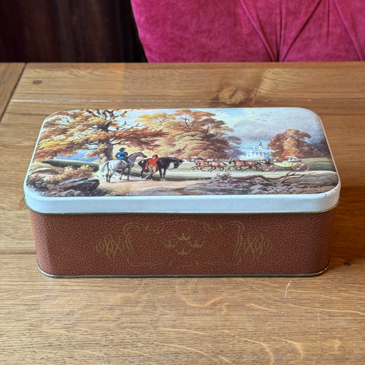 Vintage rectangular storage tin with horse-drawn carriage decor
