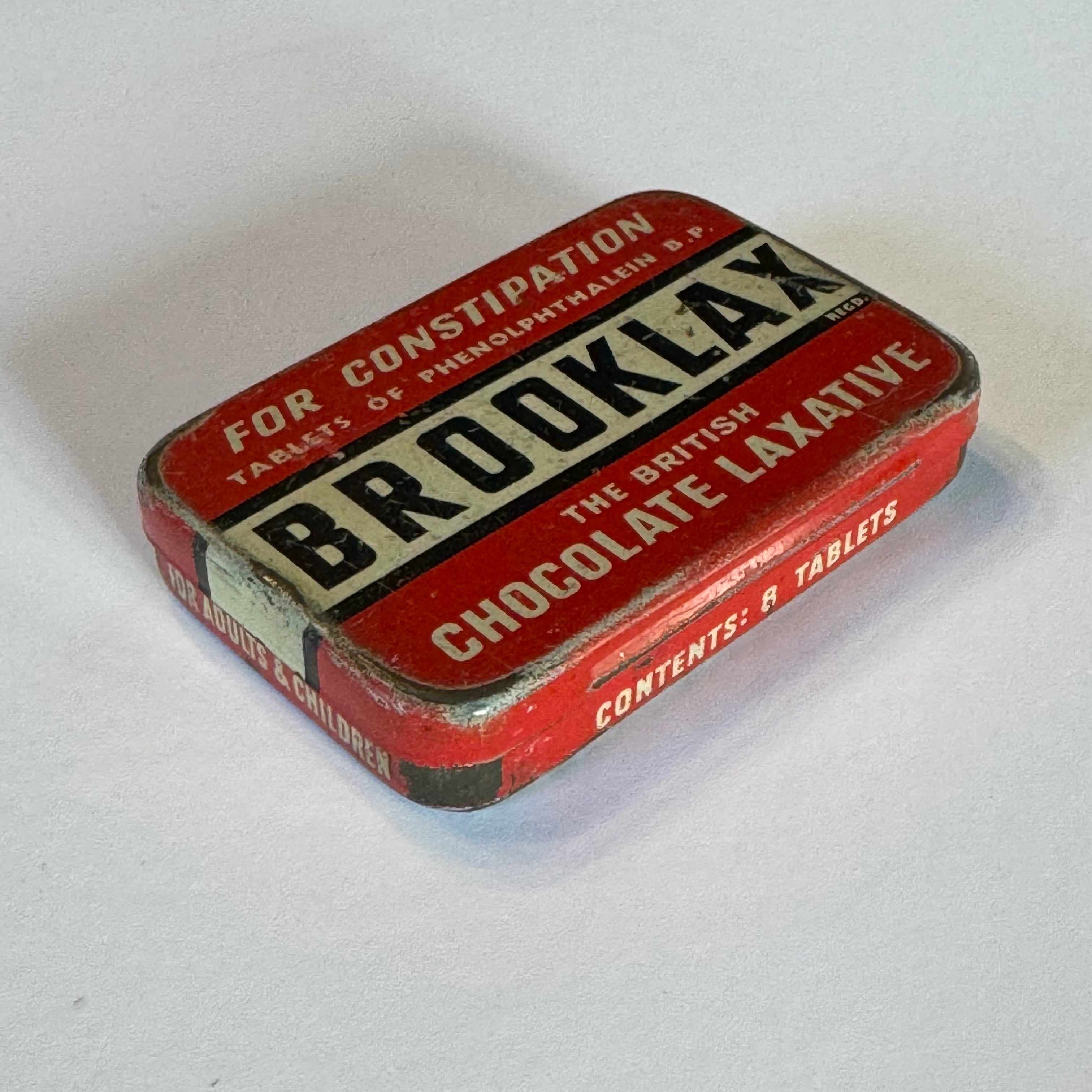 Brooklax “The British Chocolate Laxative” – vintage medicine tin – ca. 1940–1950
