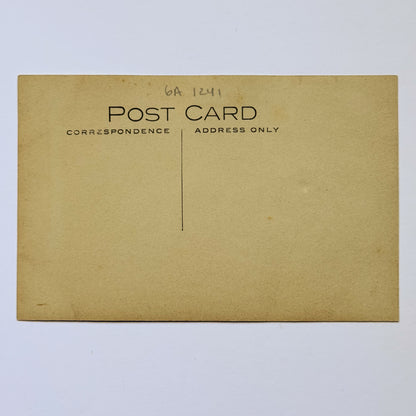 Portrait of a young man in an oval frame - British postcard (c. 1915)