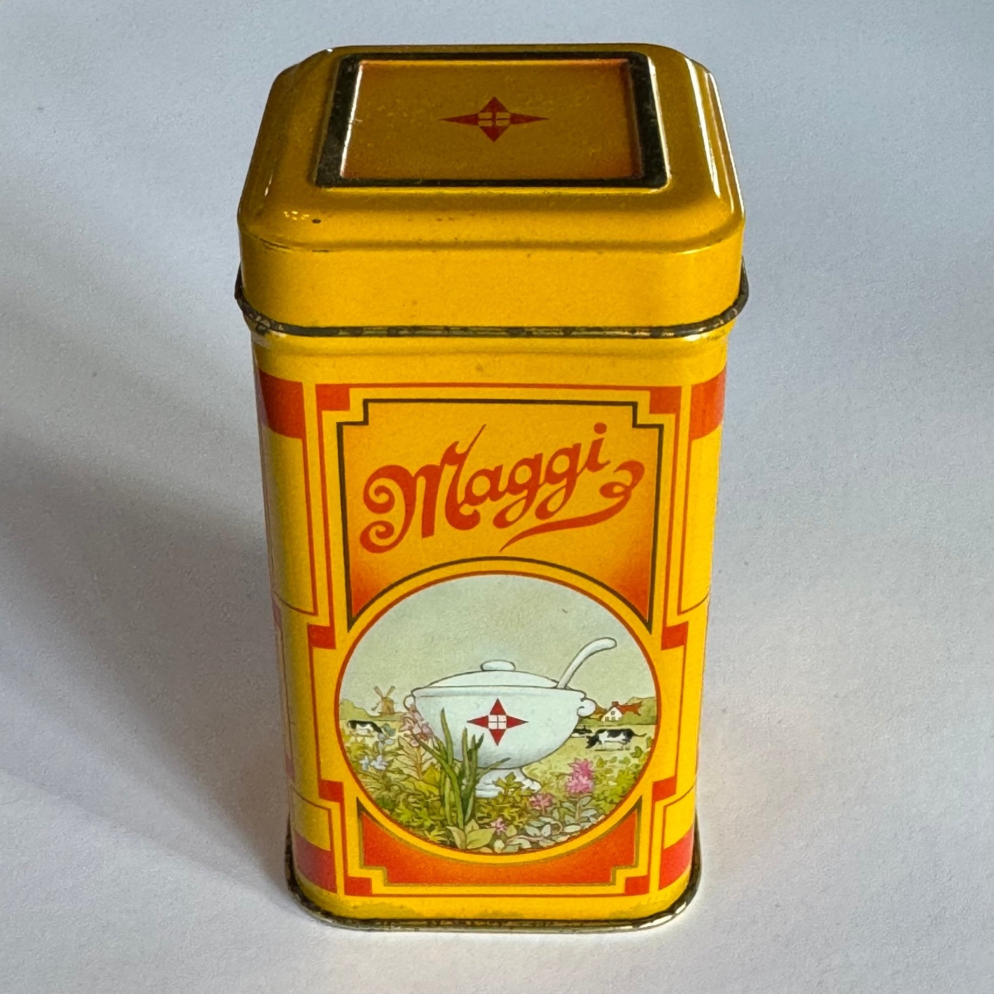 Vintage Maggi blik – geel met Art Deco ontwerp - The Collectionist