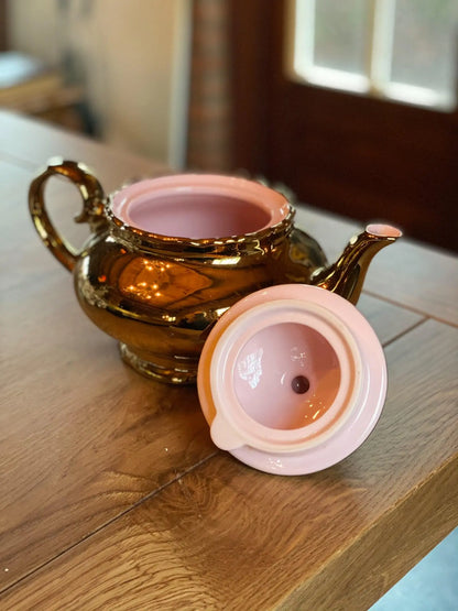 Gouden theepot - Bamestra Curiosa