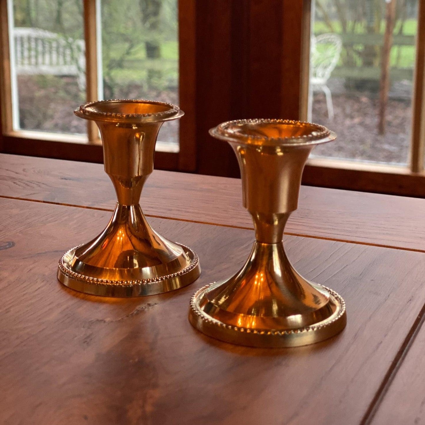 Twee kandelaars van koper - Bamestra Curiosa