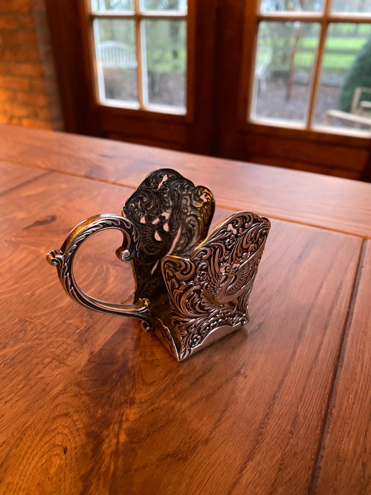 Verzilverde maggi fles houder - Bamestra Curiosa