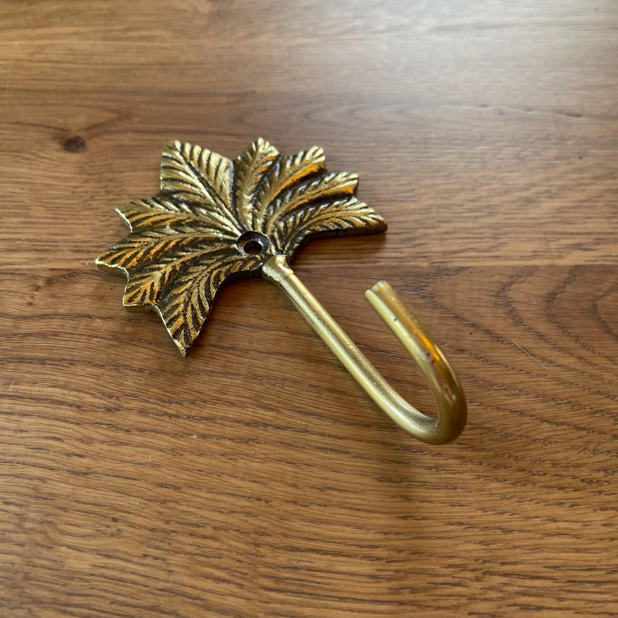 Gouden wandhaak met palm - The Collectionist