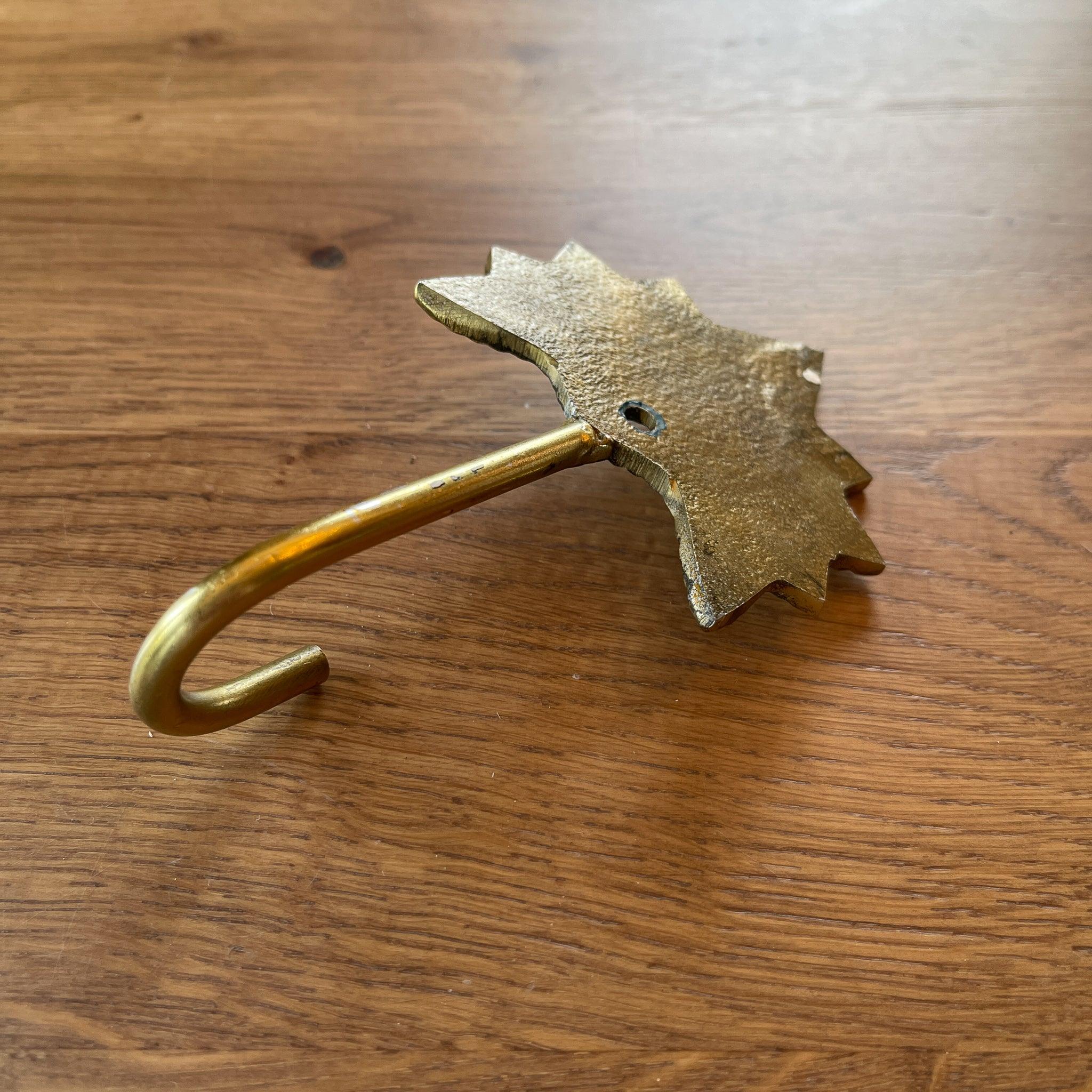 Gouden wandhaak met palm - The Collectionist