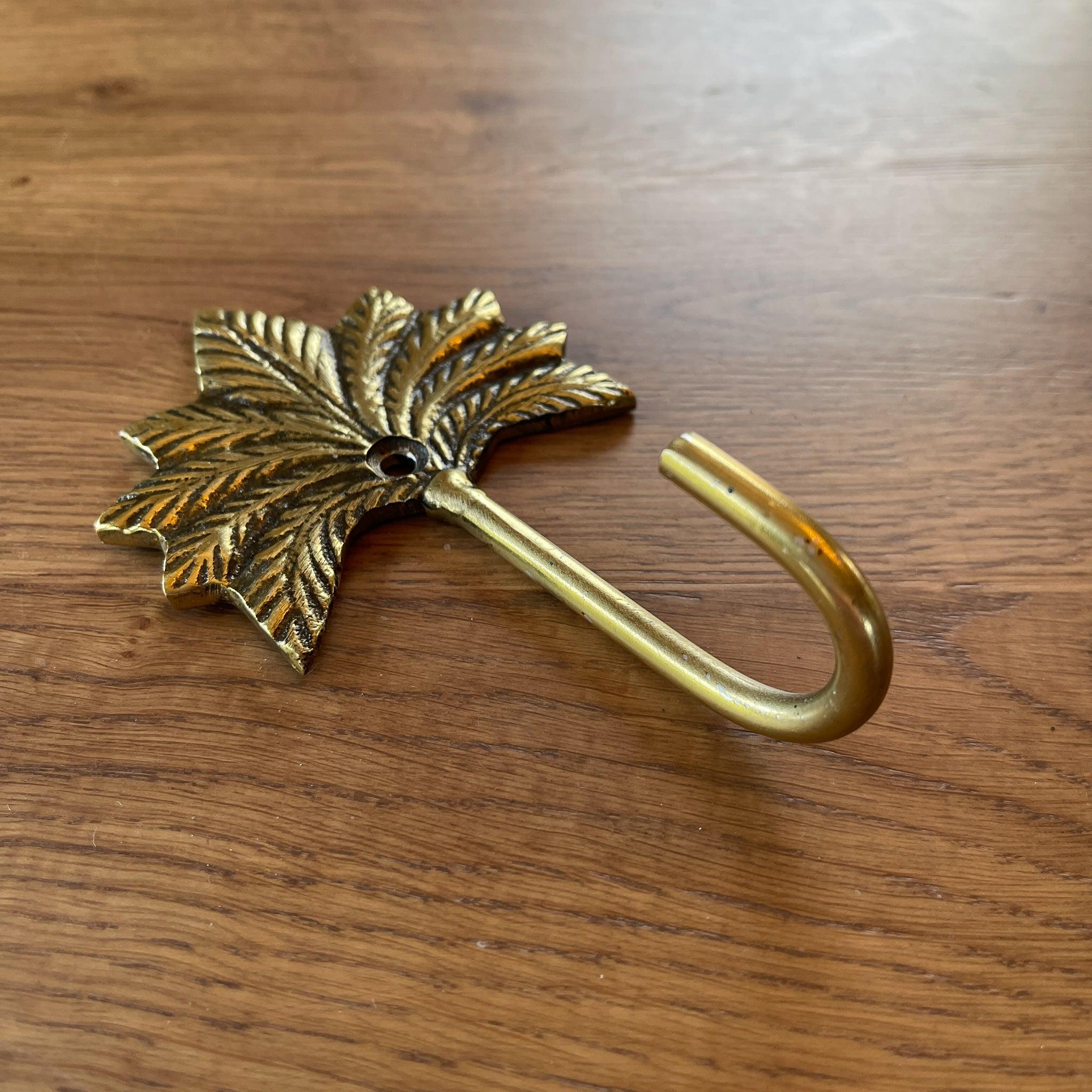 Gouden wandhaak met palm - The Collectionist