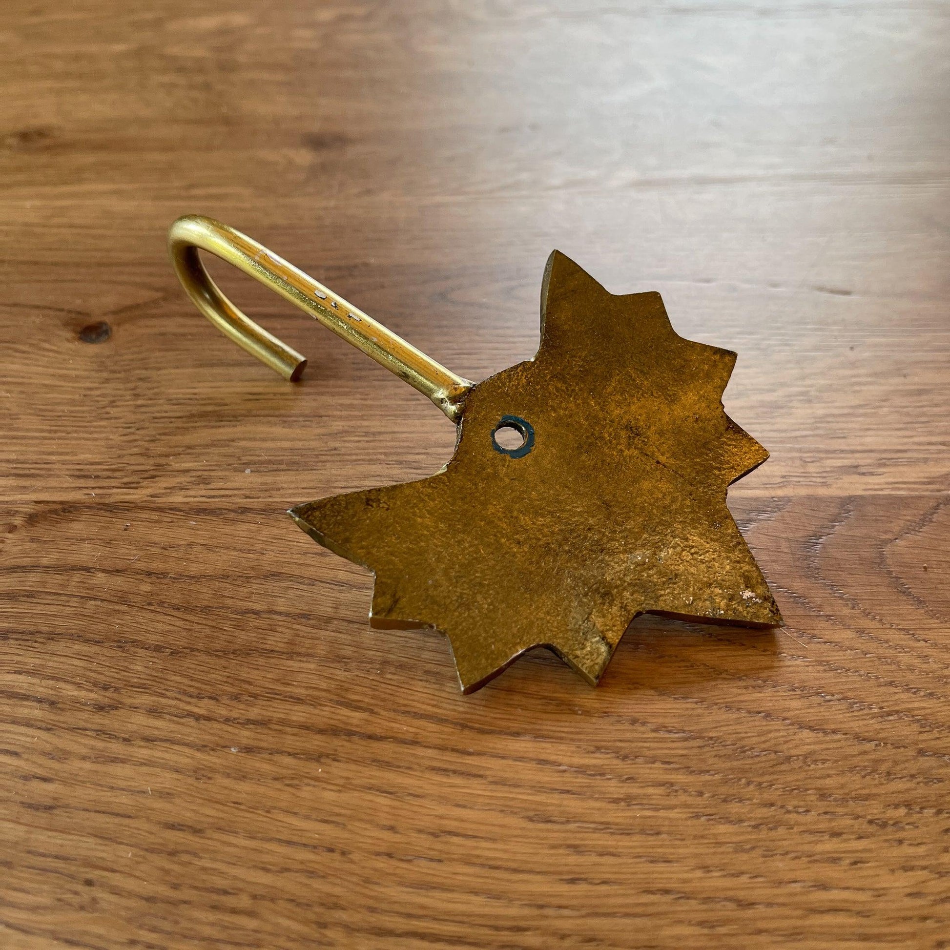 Gouden wandhaak met palm - Bamestra Curiosa