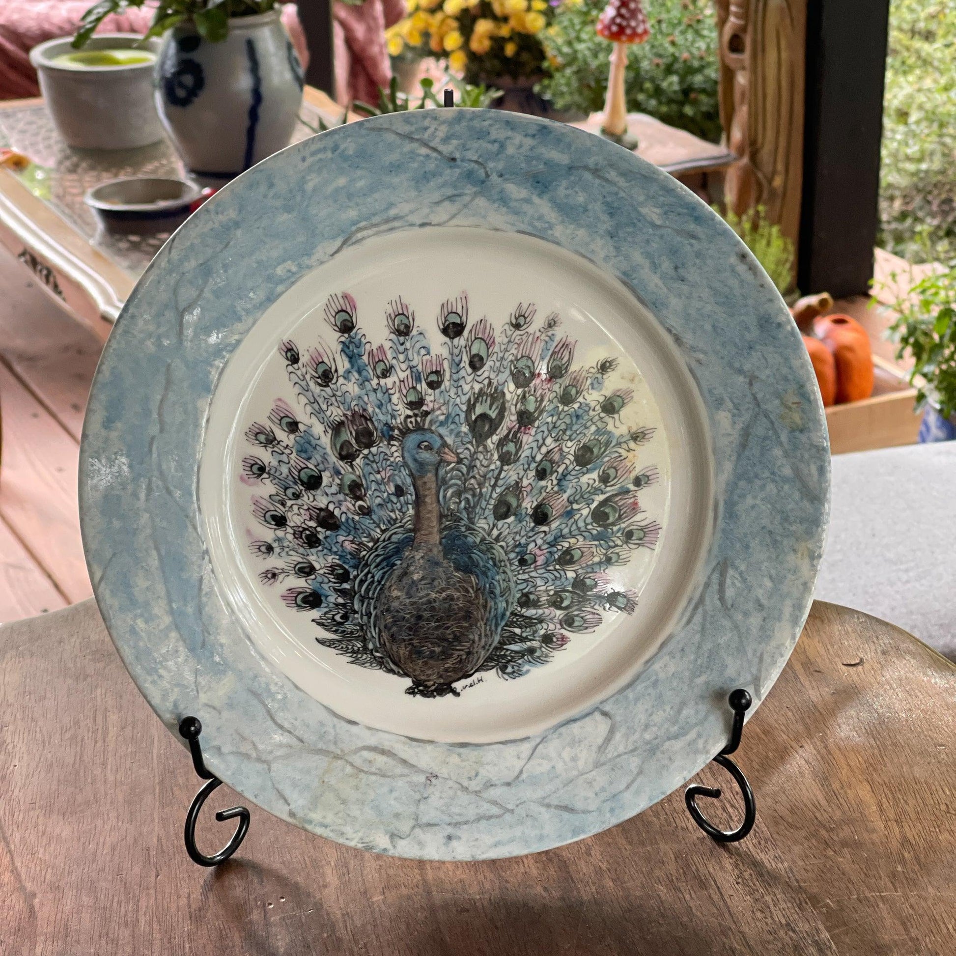 Handgeschilderd bord met een Pauw - Bamestra Curiosa