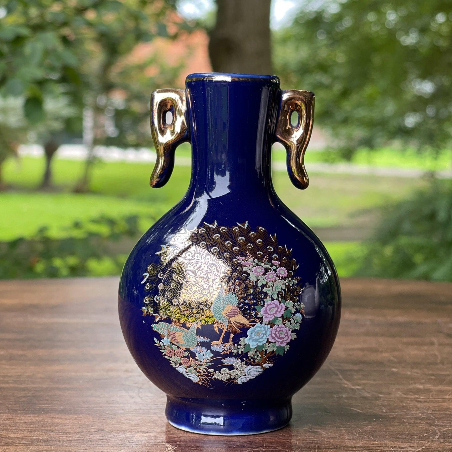 Klein blauw vaasje met een Pauw - Bamestra Curiosa