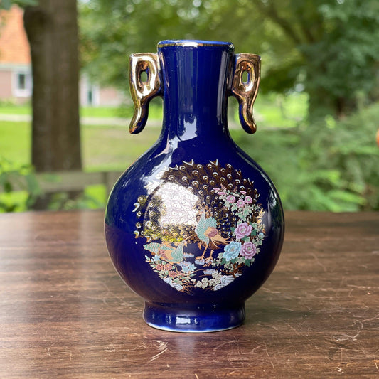 Klein blauw vaasje met een Pauw - Bamestra Curiosa