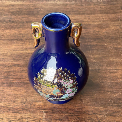 Klein blauw vaasje met een Pauw - Bamestra Curiosa