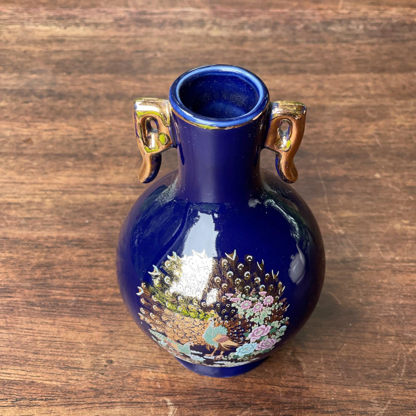 Klein blauw vaasje met een Pauw - Bamestra Curiosa