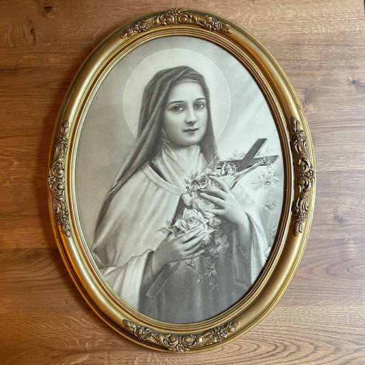 Theresia in gouden ovale lijst - Bamestra Curiosa