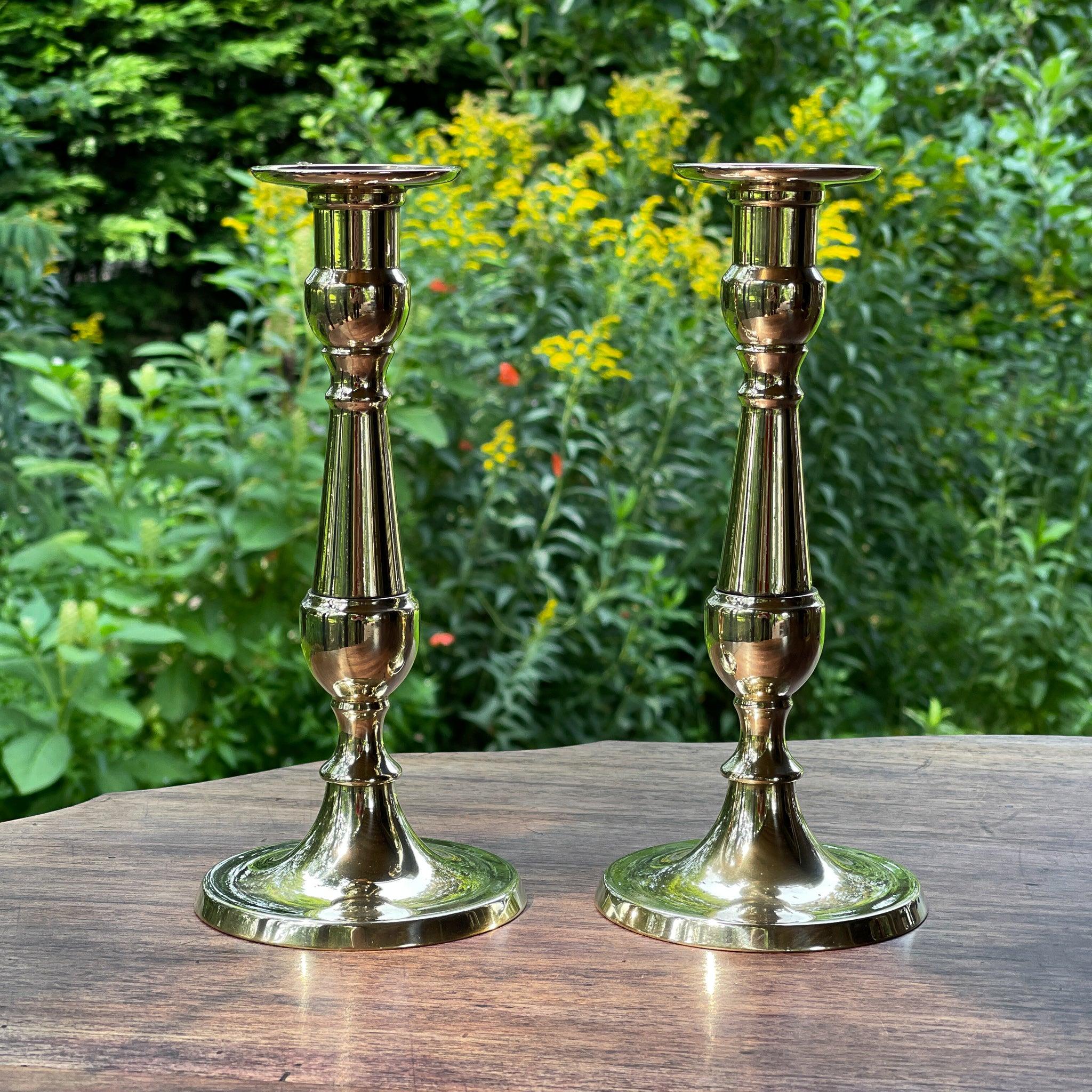 Twee koperen kandelaars - The Collectionist