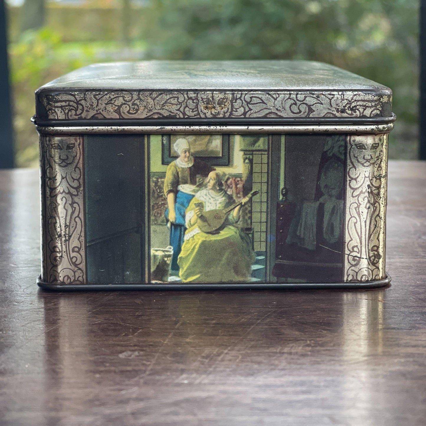 Vintage blik met Hollandse taferelen van het merk HUS - Bamestra Curiosa