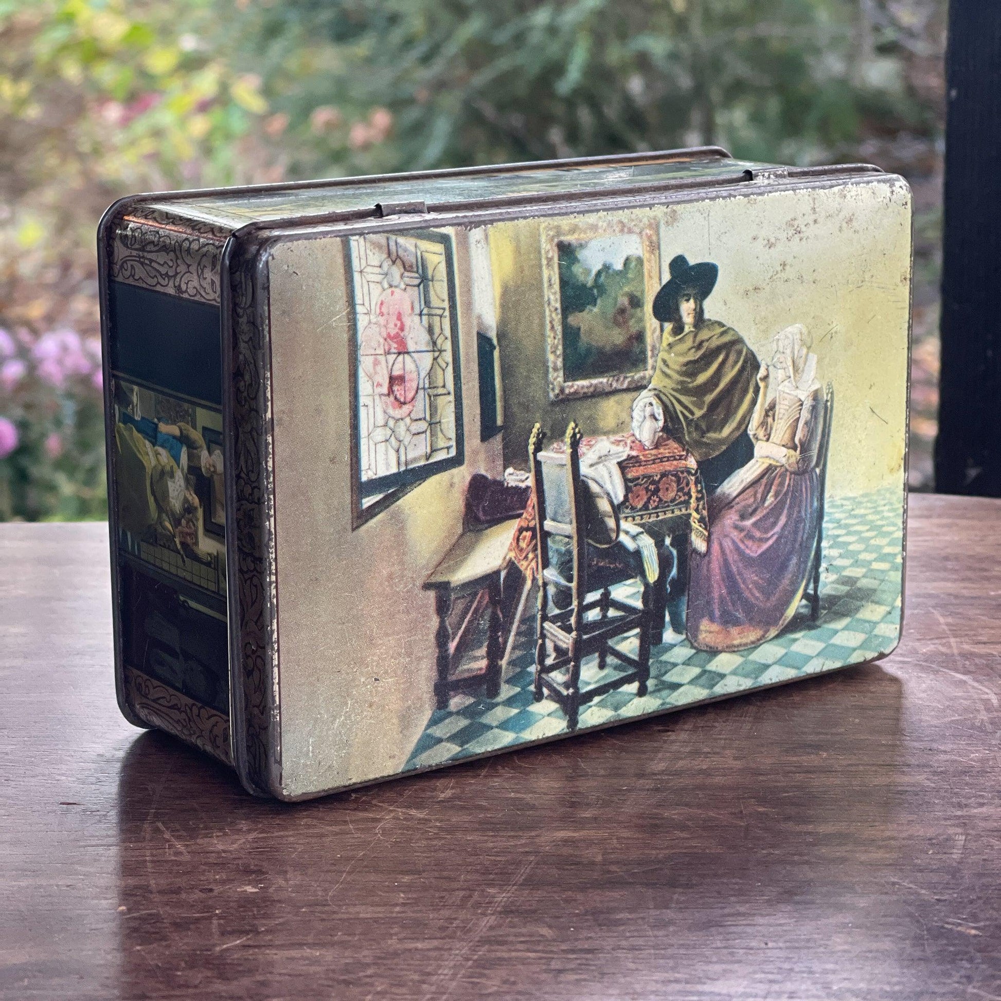 Vintage blik met Hollandse taferelen van het merk HUS - Bamestra Curiosa