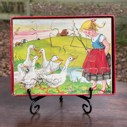 Vintage jigsaw puzzel meisje met ganzen - The Collectionist