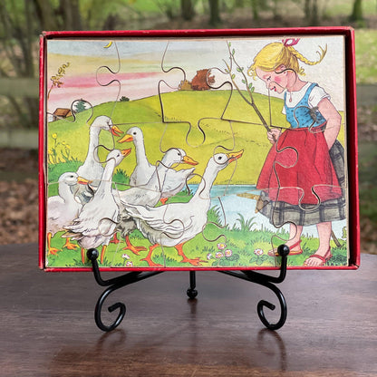 Vintage jigsaw puzzel meisje met ganzen - The Collectionist